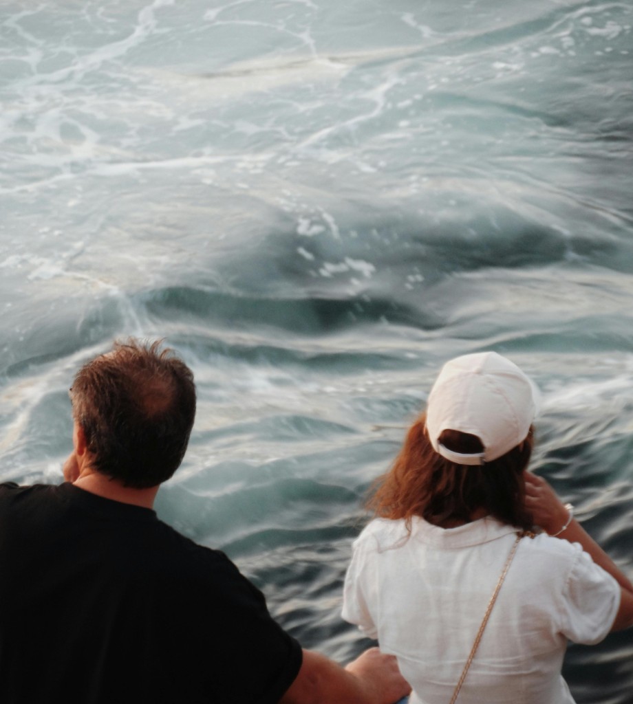 Two people by the ocean